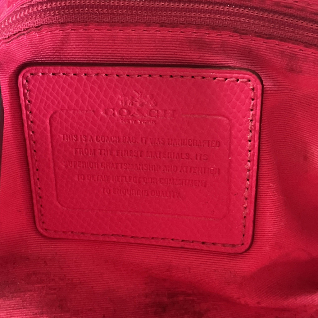 The Coach Crossgrain Pink Mini Bennett Satchel is a crossbody handbag purse