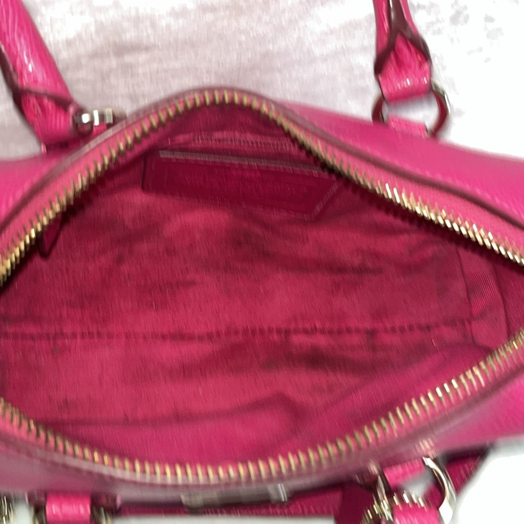 The Coach Crossgrain Pink Mini Bennett Satchel is a crossbody handbag purse