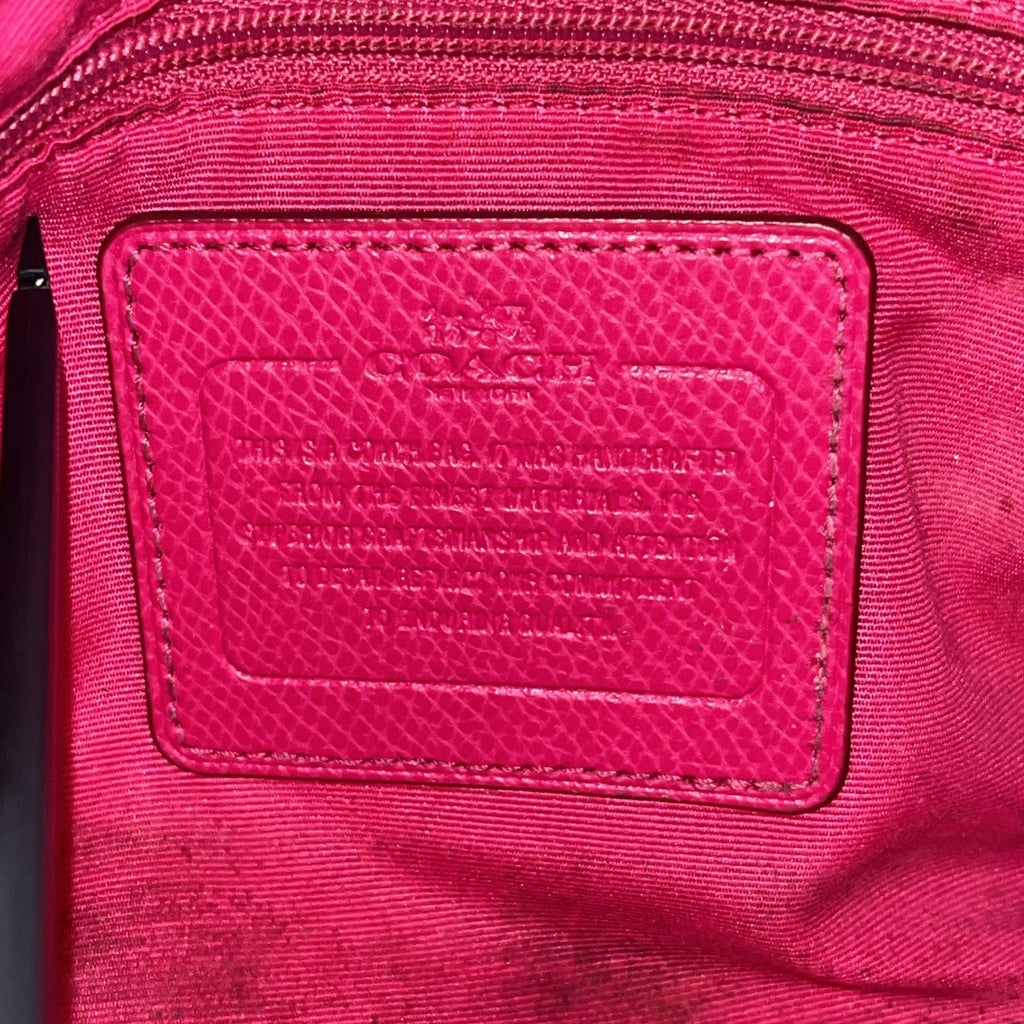 The Coach Crossgrain Pink Mini Bennett Satchel is a crossbody handbag purse
