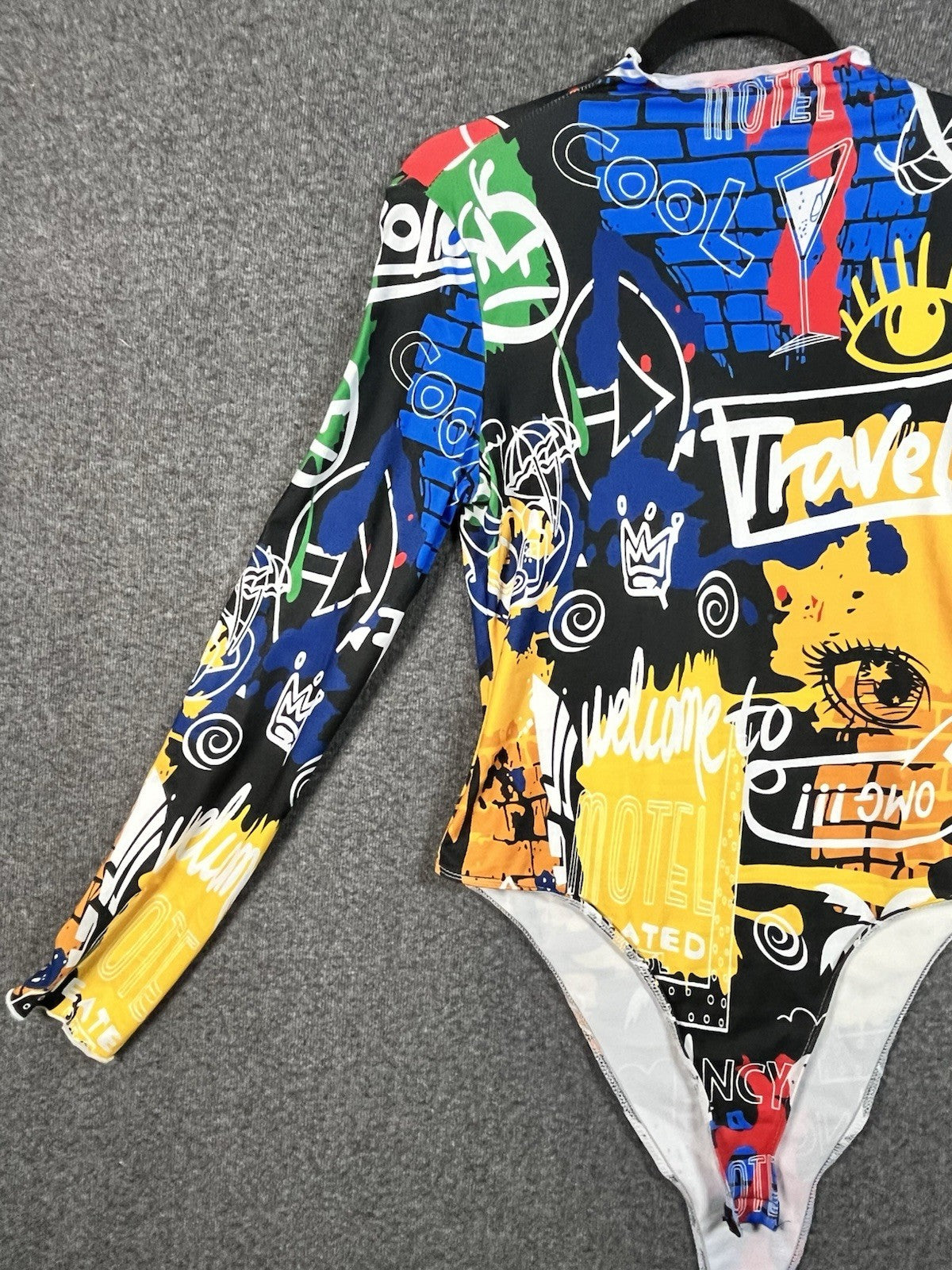 SHEIN women's graffiti print mock neck bodysuit Size Large Button Closure 