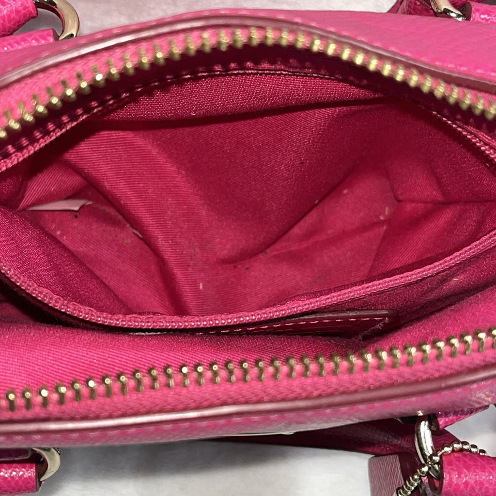 The Coach Crossgrain Pink Mini Bennett Satchel is a crossbody handbag purse