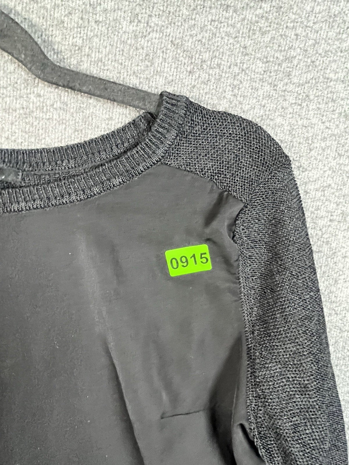 H&M black long-sleeved shirt with a shiny front panel and ribbed sleeves M 