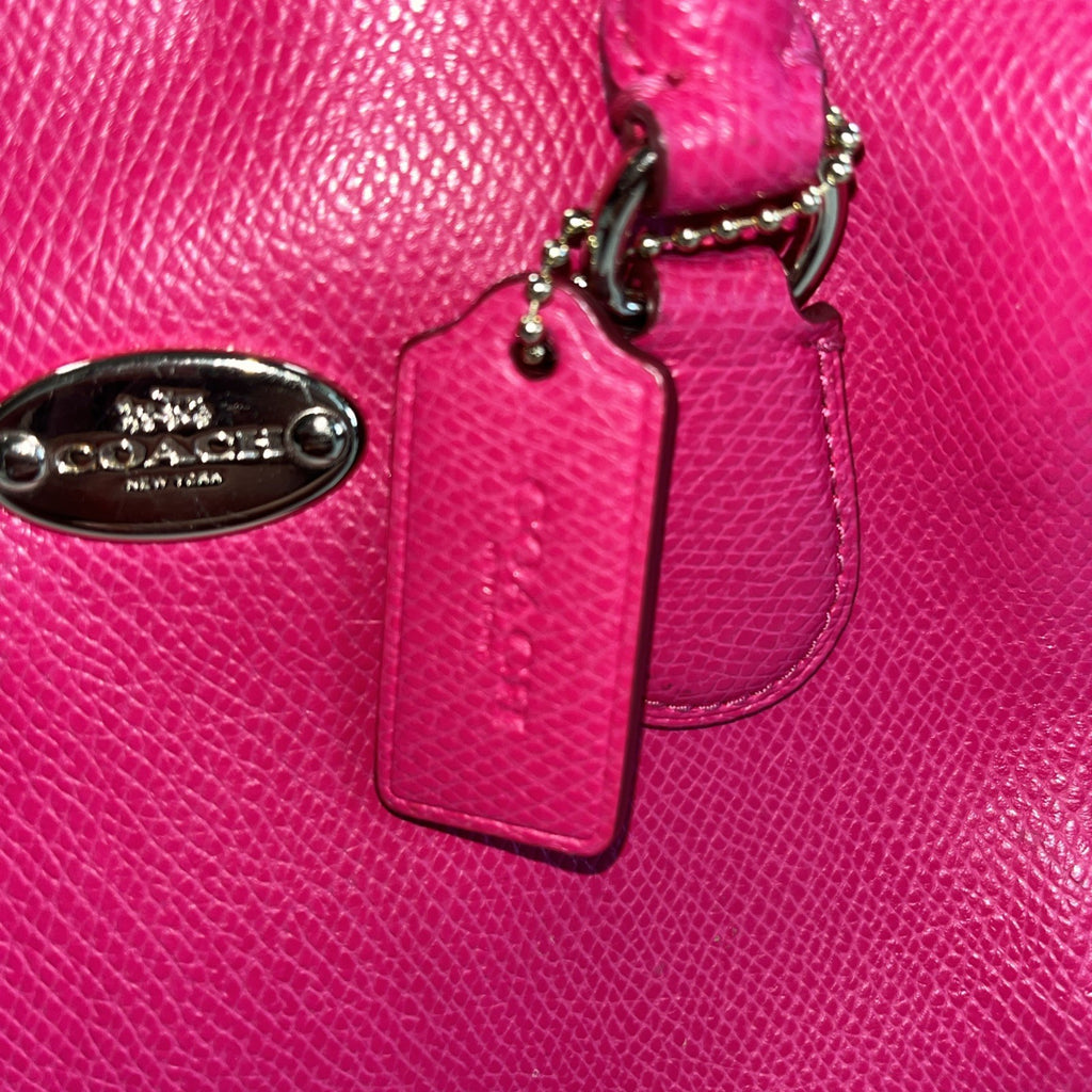 The Coach Crossgrain Pink Mini Bennett Satchel is a crossbody handbag purse