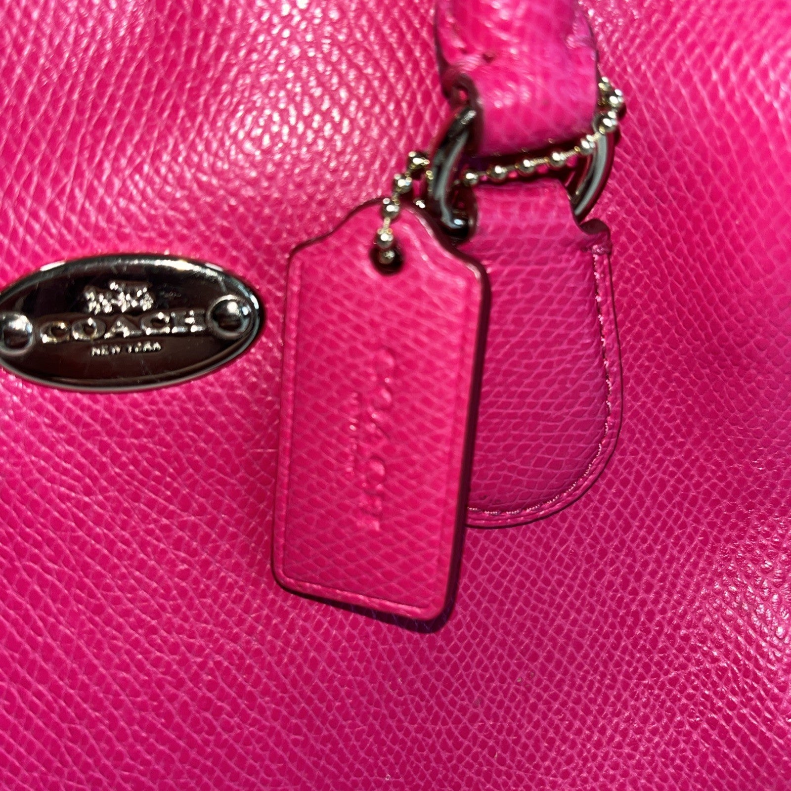 The Coach Crossgrain Pink Mini Bennett Satchel is a crossbody handbag purse