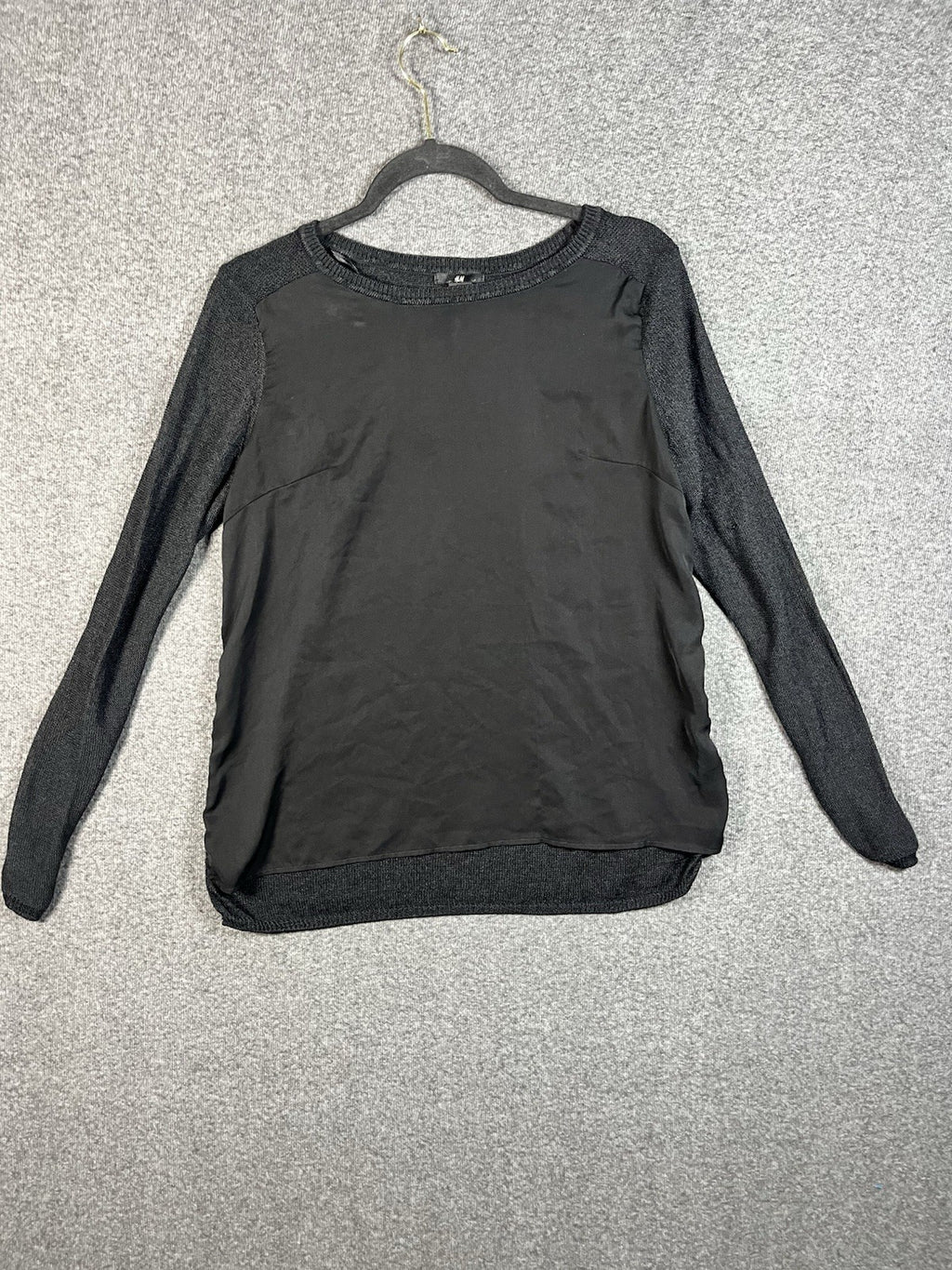H&M black long-sleeved shirt with a shiny front panel and ribbed sleeves M 
