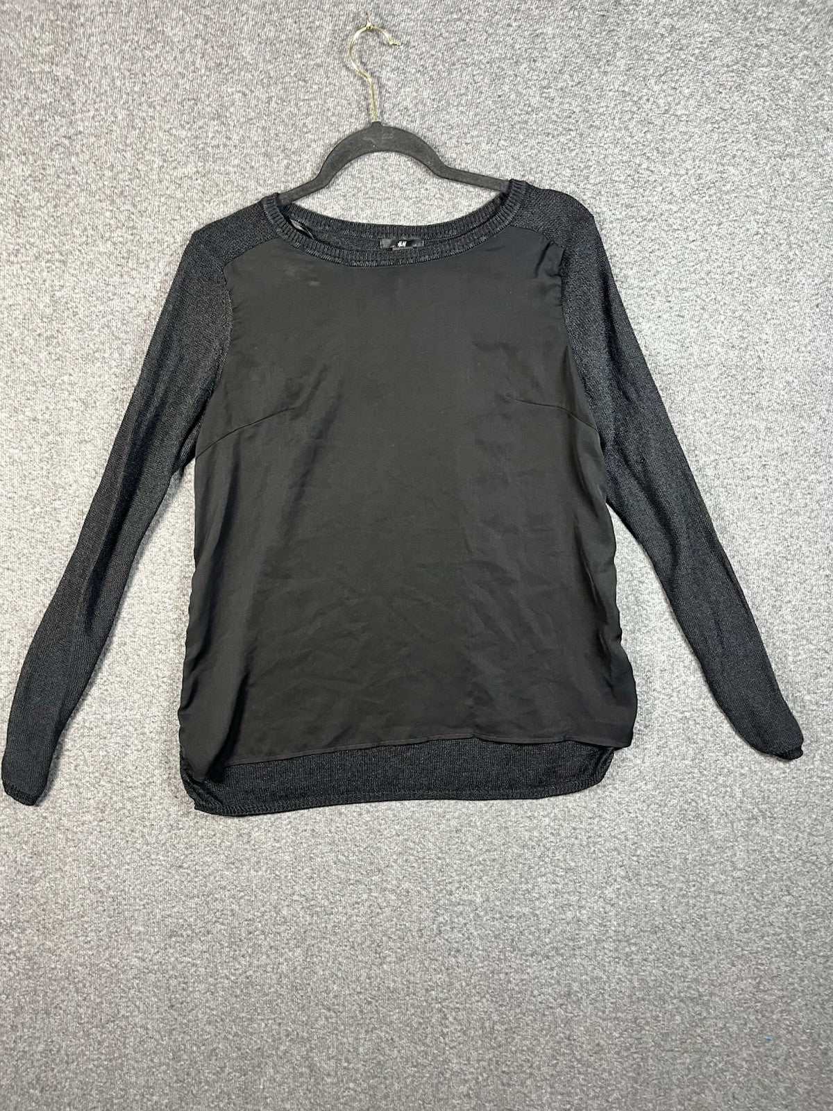 H&M black long-sleeved shirt with a shiny front panel and ribbed sleeves M 