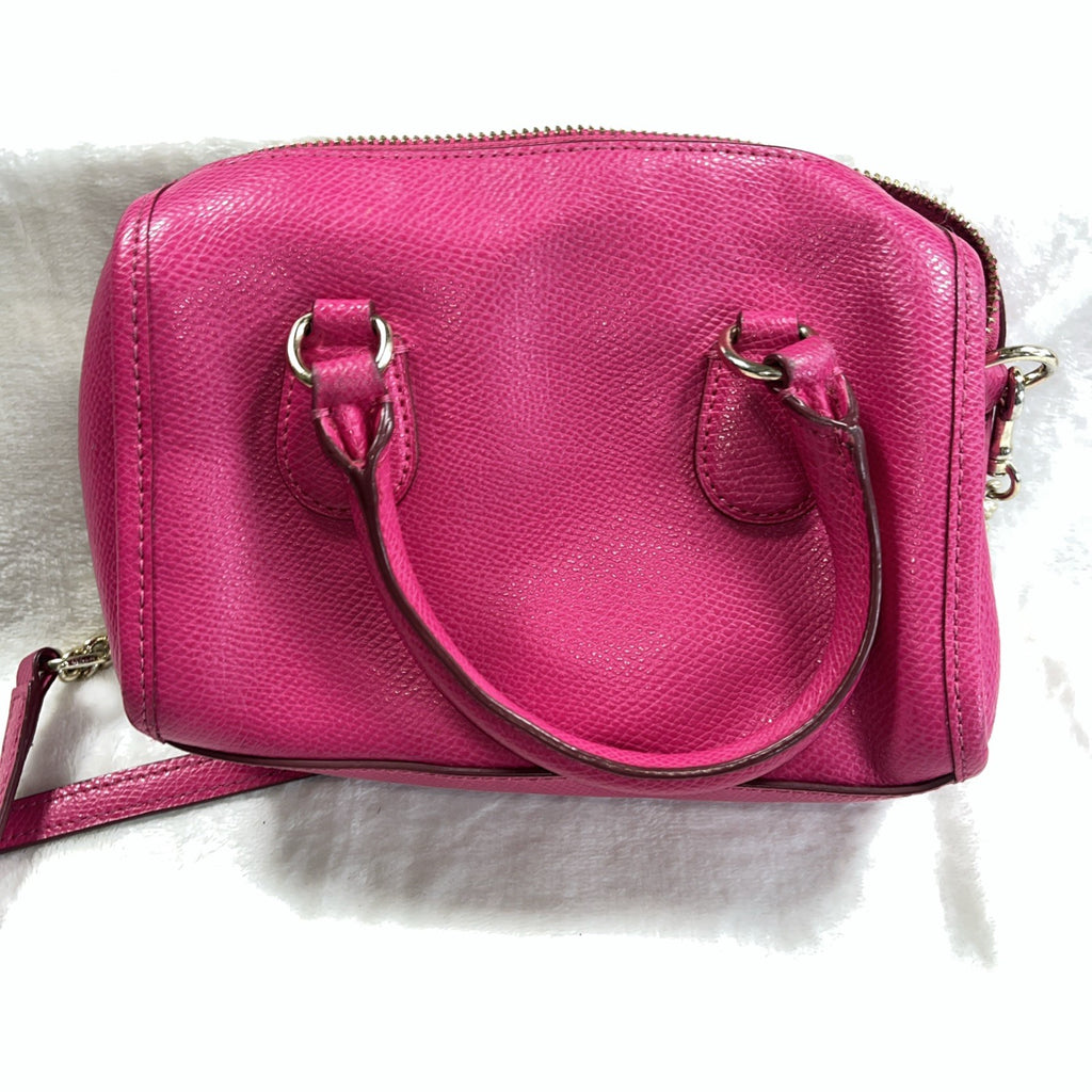 The Coach Crossgrain Pink Mini Bennett Satchel is a crossbody handbag purse