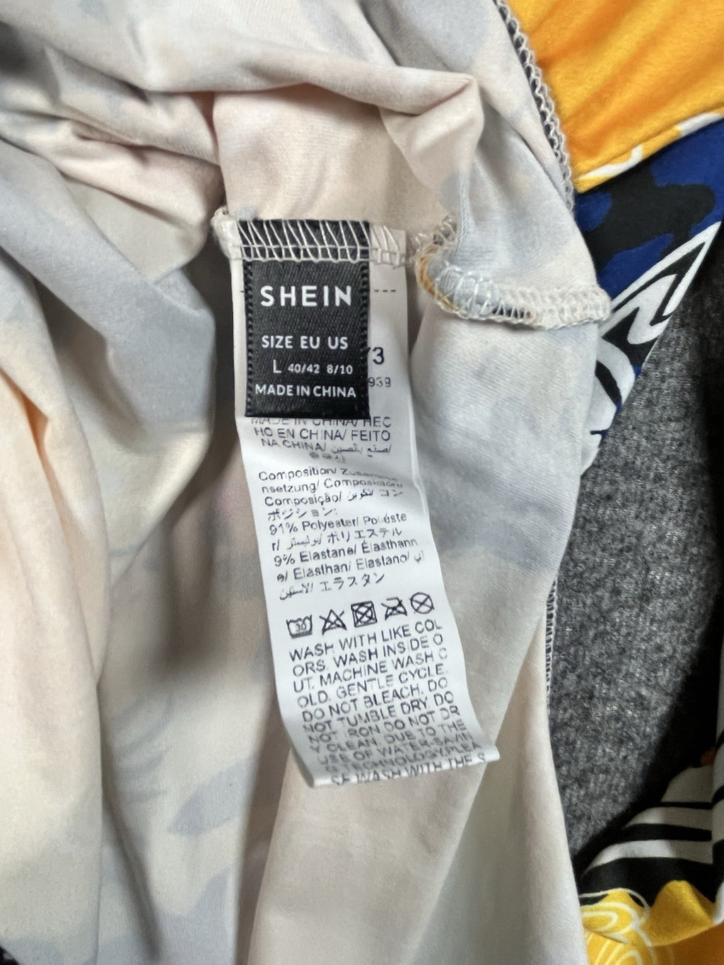 SHEIN women's graffiti print mock neck bodysuit Size Large Button Closure 
